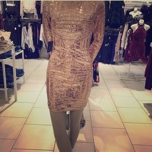 Rose gold open back long sleeve dress